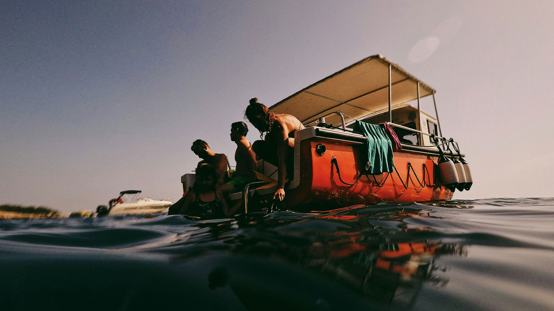 Famille profitant d'une balade en bateau sur le Bassin d'Arcachon près du Cap Ferret